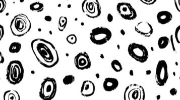 A seamless pattern featuring abstract black and white circular shapes on a white background. The design includes various sizes and styles of circles, creating a playful and artistic look. vector