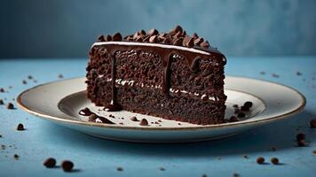 Delicious slice of chocolate cake with dripping chocolate and chocolate chips photo