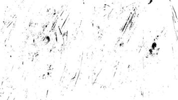 A textured background featuring random black scratches and marks on a white surface, creating an abstract and distressed appearance. vector