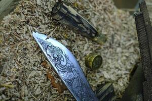 Enep knife of Thai native hand carved works The sheath and handle are made of ebony wood photo
