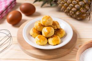 Nastar cookies on a round white plate background photo