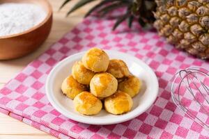 Traditional nastar cookies on a round white plate photo