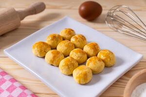 Traditional nastar cookies on a white square plate photo