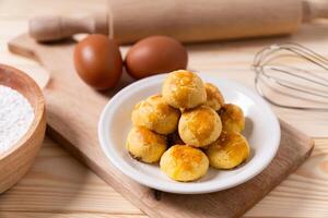 Traditional nastar cookies on a round white plate concept photo