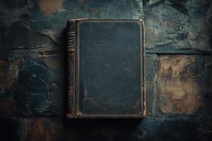 Worn Leather Bound Book on a Slate Background photo