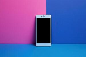 White Smartphone on Blue and Pink Background photo