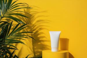 White Tube on Yellow Platform with Palm Leaf Shadow photo