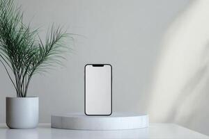 Minimalist Composition with Smartphone, Plant, and Concrete Platform photo