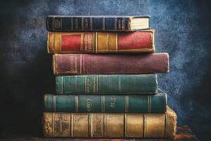 Stack of Vintage Leather-Bound Books with Gilt Lettering photo
