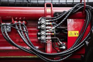 Hoses of modern hydraulic machine photo