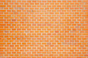 Red color texture of brick wall for brickwork concept background design photo