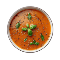 bowl of tomato soup garnished with fresh basil leaves and cracked black pepper, creating vibrant and appetizing presentation. rich red color of soup contrasts beautifully with green basil png