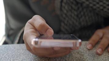 Engaging with technology while sitting at a table video
