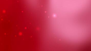 Red gradient background features small glowing particles video