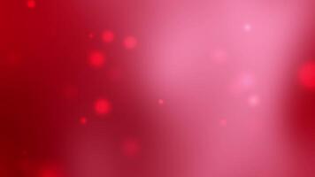 Red gradient background features soft pink glowing circles video