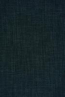 Textured Fabric Surface with Dark Tones Perfect for Design Projects photo
