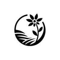 A stylized monochrome depicting a flower within a circle, with a fieldlike landscape at the bottom, showcasing simplicity and nature. vector