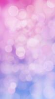 Abstract bokeh background animation with gently flickering bokeh light spheres on a pink blue color gradient. This elegant vertical animation is full HD and looping. video