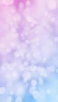 Bokeh background animation with gently flickering bokeh light spheres on a pink blue color gradient. This elegant vertical animation is full HD and a loop. video