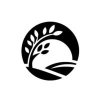 A stylized black and white emblem within a circle, featuring a tree silhouette with leaves against a backdrop suggestive of a setting sun over rolling hills. vector