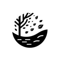 A minimalist black and white circular illustration of a tree losing its leaves in a stylized landscape. vector