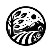 A stylized black and white circular landscape illustration showcasing a tree, rolling farmland, mountains, a sun, and leaves. vector