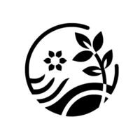 Monochromatic botanical emblem featuring a stylized flower, leafy branch, and abstract landscape elements within a circular frame. vector