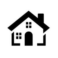 A minimalist, black and white illustration of a house with a gabled roof, a chimney, rectangular windows, and an arched door, set against a plain white background. vector