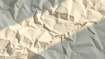 crumpled paper on a table photo