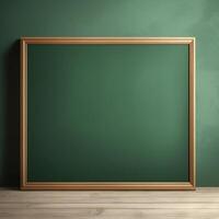 Empty wooden frame on a green wall with a wooden floor photo