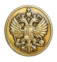 The russian coat of arms on a gold button photo