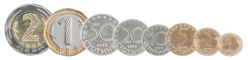 Complete set of Bulgarian coins stand in a row one after another. Isolated over white background. photo