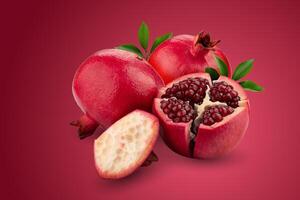Ripe pomegranate fruit isolated on a red background photo