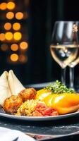 Sophisticated plate of food paired with a glass of wine set on a table for an elegant dining experience photo