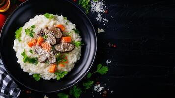 Colorful plate of mashed potatoes with carrot risotto garnished with fresh herbs for a gourmet dining experience photo