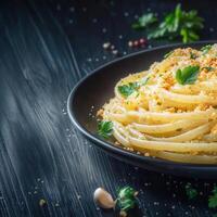 Delicious plate of spaghetti with fresh parsley and olive oil served elegantly on a white tablecloth for dinner photo