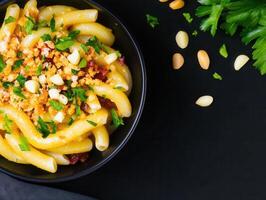 Nutritious bowl of pasta with meat and vegetables offering a colorful and flavorful combination for a healthy meal photo