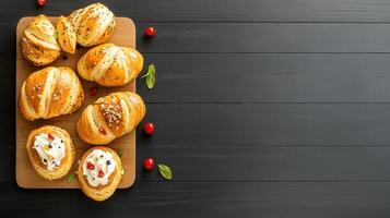 A rustic wooden cutting board showcasing an array of delicious pastries perfectly crafted for a culinary delight experience photo