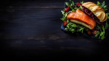 Freshly made sandwich filled with savory salmon and crunchy vegetables for a delicious and nutritious meal experience photo