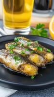 Deliciously plated fish dish accompanied by a refreshing glass of beer sitting on a rustic wooden table photo