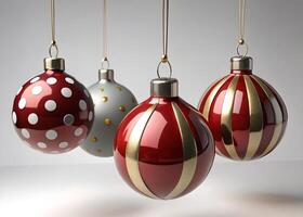 Bright and festive red, green, gold, and blue glass Christmas ornaments hanging on strings, ready to decorate a tree for the holiday season photo