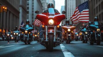 Motorcycle group driving together on road. Bikes with lights on going forward in city. Large American flag waving in background photo