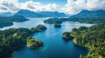 Lake view from above. Green trees cover islands in blue water. Distant mountains and cloudy sky create scenic landscape. photo