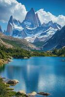 Mountain peak rises over the lake. Blue water surface with rocks in the foreground. Green forest surrounds the alpine lake under a cloudy sky. photo