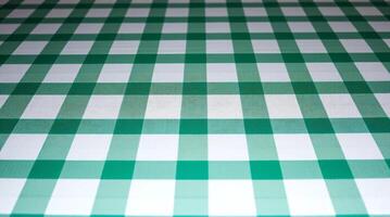 A table cloth with a green and white checkered pattern photo