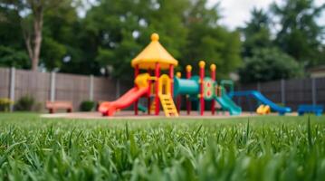 A playground with a colorful slide and slide photo