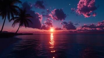 A sunset over the ocean with palm trees photo