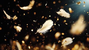 Feathers falling from the sky on a black golden background photo