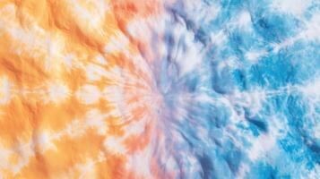 A tie dye pattern with orange and blue colors photo