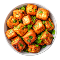Delicious Crispy Golden Bites of Seasoned Tofu Garnished with Fresh Herbs png